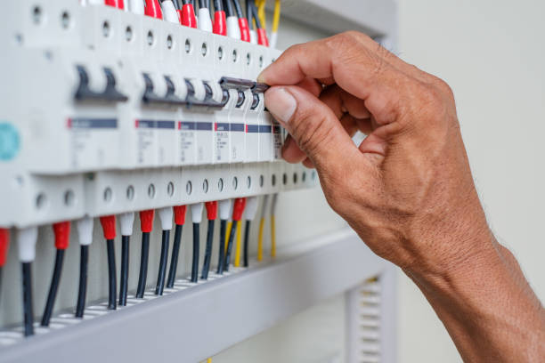 Electrician during fuse box installation | Property Checks